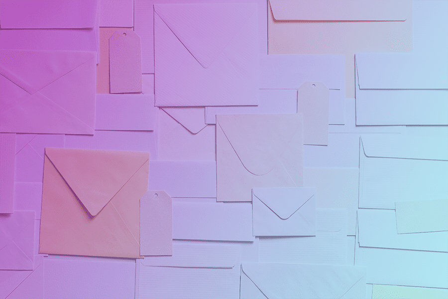 A collection of mailing envelopes with a pink and blue gradient overlay